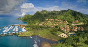 Aerial view of Los Sueños Marina and its hillside resort villas surrounded by rainforest and Pacific coastline near Jaco Beach, Costa Rica