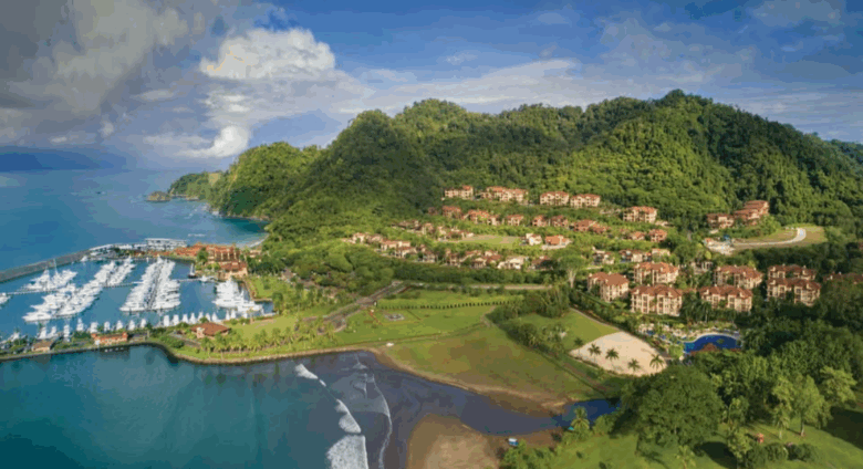 Aerial view of Los Sueños Marina and its hillside resort villas surrounded by rainforest and Pacific coastline near Jaco Beach, Costa Rica