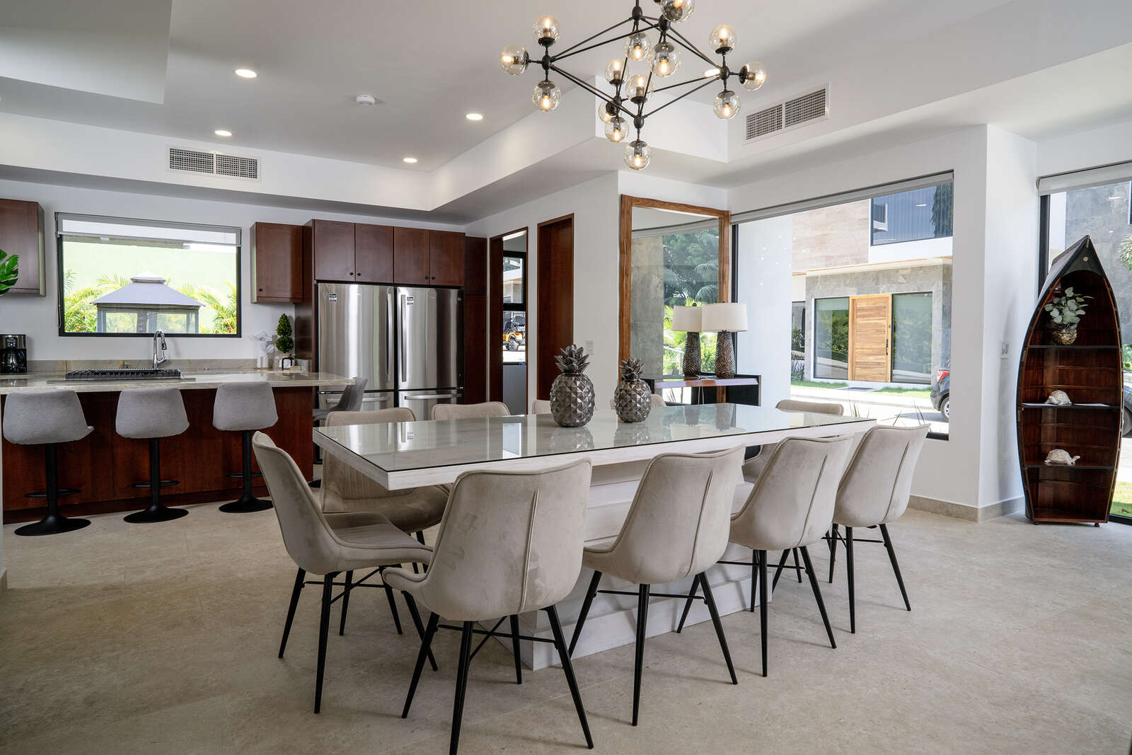 Night view of pool and living area at Villa 3