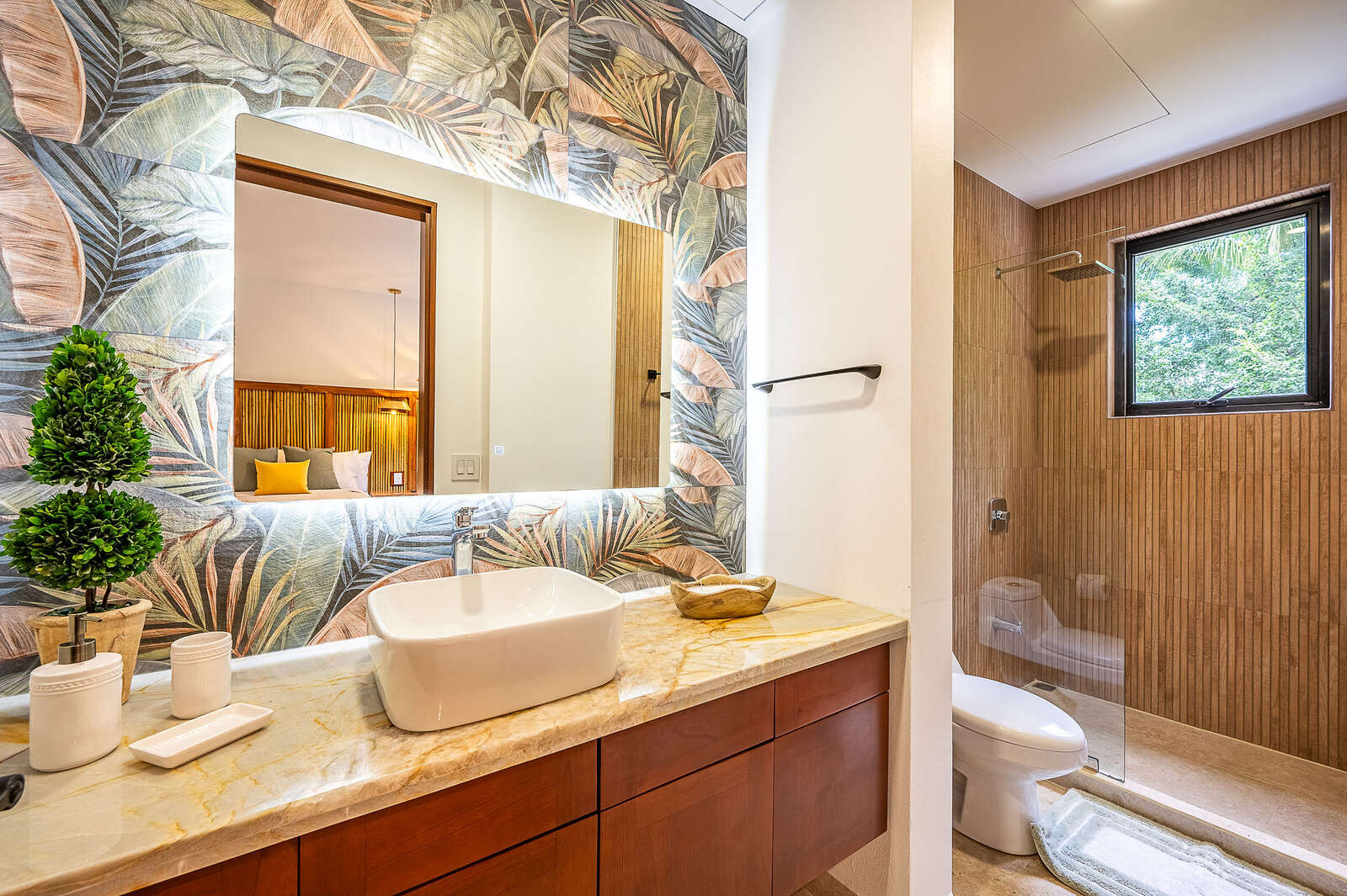 Night view of pool and living area at Villa 3