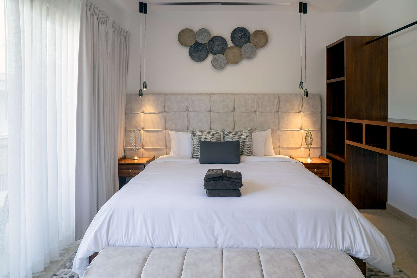 Night view of pool and living area at Villa 3