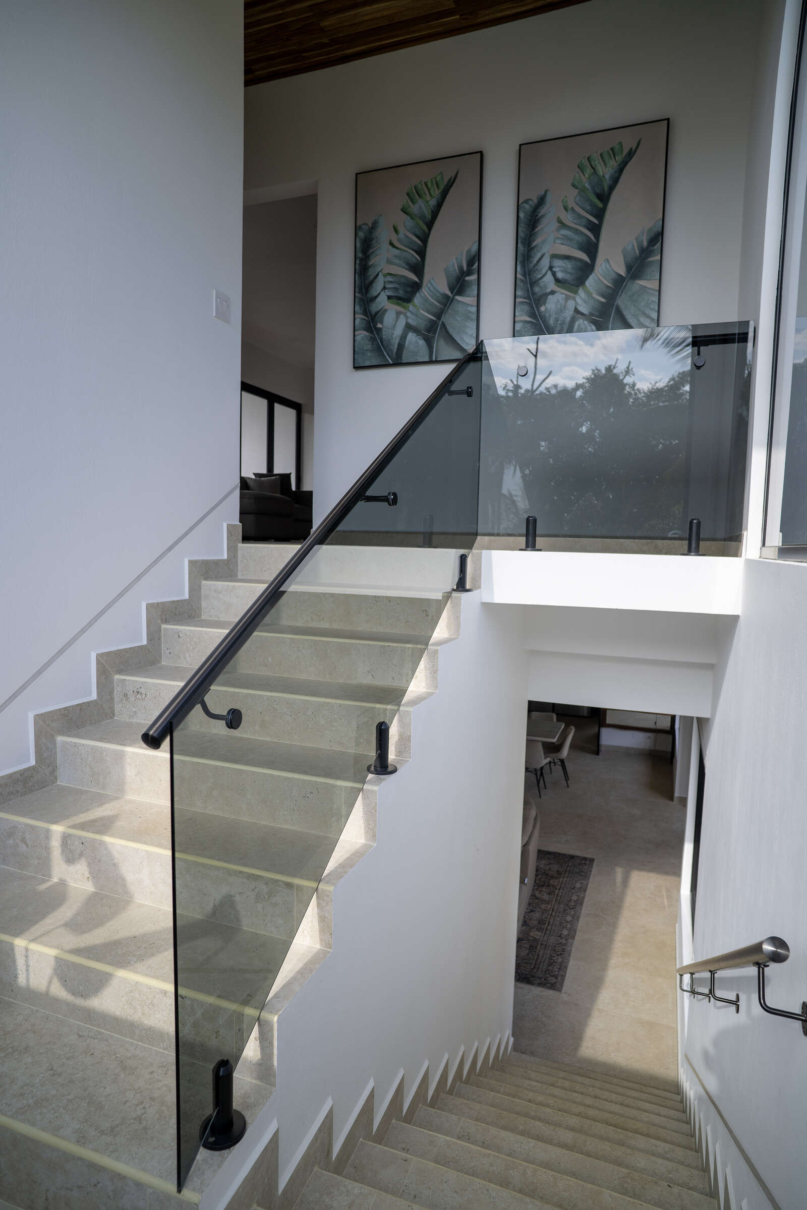 Night view of pool and living area at Villa 3