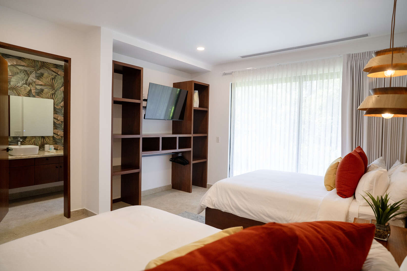 Night view of pool and living area at Villa 3