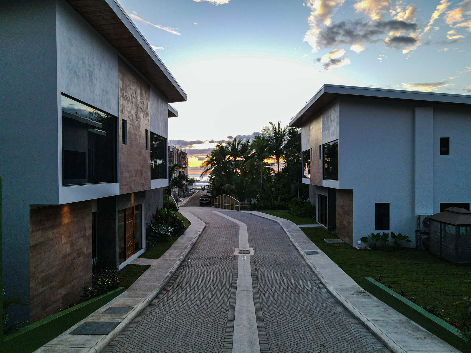 Night view of pool and living area at Villa 3