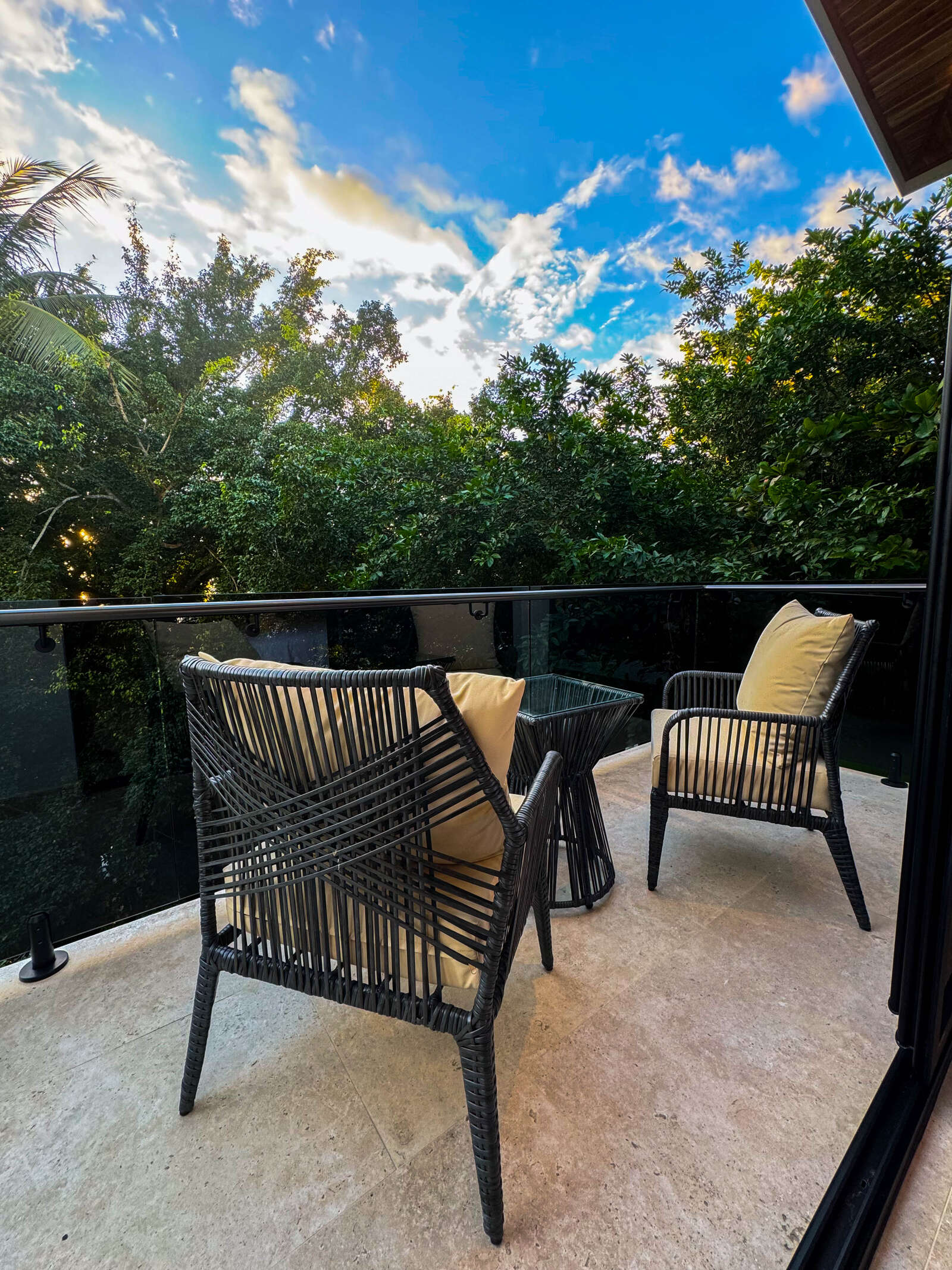 Night view of pool and living area at Villa 3