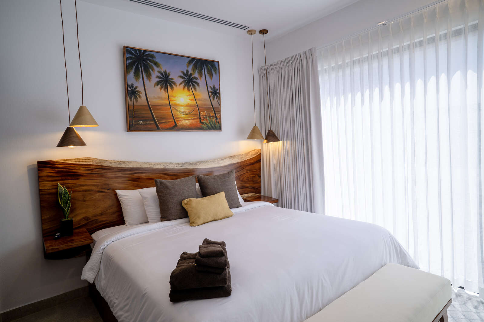 Night view of pool and living area at Villa 3